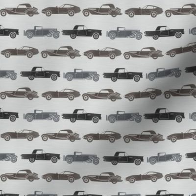 Small Scale Classic Cars in Black Silver Steel on Metallic Grey Background