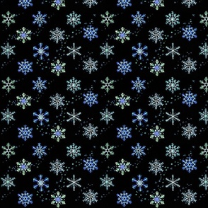 Glowing snowflakes on black 