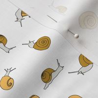 small - snails in mustard yellow on white