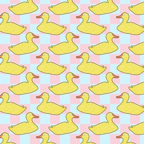 Yellow Rubber Duck On Baby Pink & Blue Background