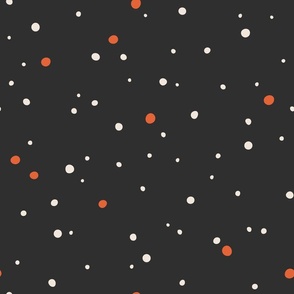 Abstract orange and white polka dots on dark grey