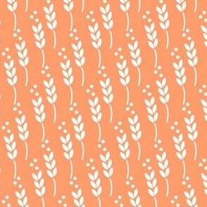White leaf design on orange background