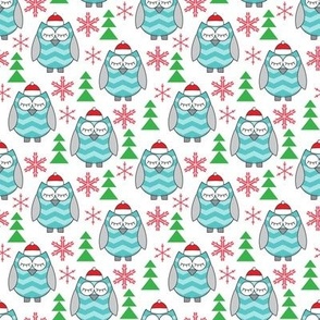 small teal owls with santa hats