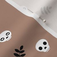 minimalist skulls and boho leaves for fall and halloween on latte caramel brown