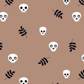 minimalist skulls and boho leaves for fall and halloween on latte caramel brown