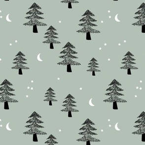 Boho Christmas forest with pine trees moon and stars winter night black on sage green