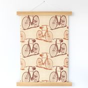 Brown and russet vintage bicycles on cream