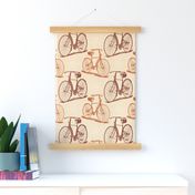 Brown and russet vintage bicycles on cream