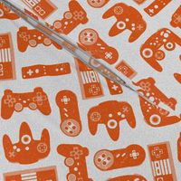 Game Controllers in Orange and White