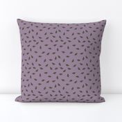 Scattered Leaves on Lilac Background