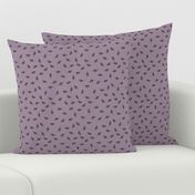 Scattered Leaves on Lilac Background