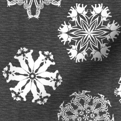 African Animal Snowflakes on Visually Textured Dark Gray