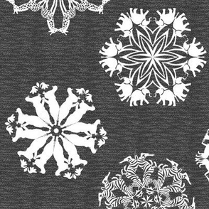 African Animal Snowflakes on Visually Textured Dark Gray