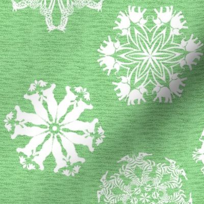 African Animal Snowflakes on Visually Textured Green