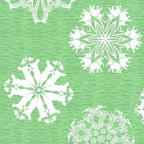 African Animal Snowflakes on Visually Textured Green