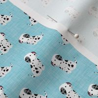 Small Scale Black and White Dalmation Puppy Dogs on Blue