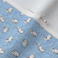Small Scale Bunny Rabbit Sketches on Blue Crosshatch
