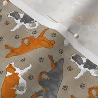 Tiny Trotting Cavalier King Charles Spaniels and paw prints - faux linen