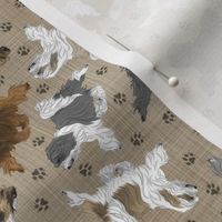 Tiny Trotting assorted Tibetan Terriers and paw prints - faux linen