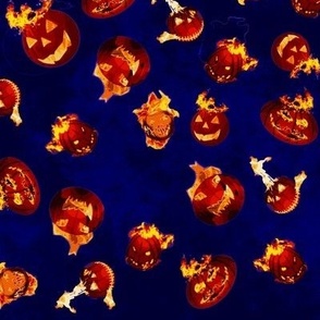 Flaming pumpkins on dark blue