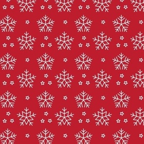 Simple white snowflakes on red background