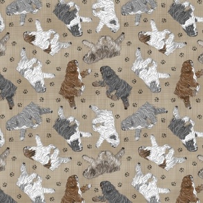 Trotting Polish Lowland Sheepdogs and paw prints - faux linen