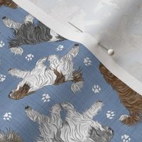 Tiny Trotting tailed Polish Lowland Sheepdogs and paw prints - faux denim