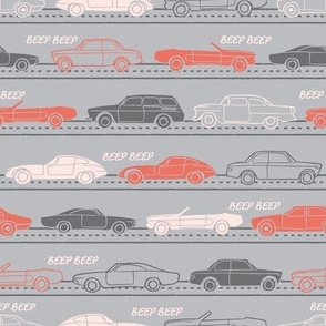 (small scale) retro cars on the road with grey and orange