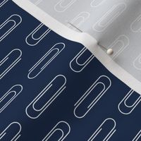 Paper Clips on Navy