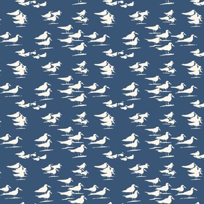 Birds on the Beach, Silhouette in Cream on Dark Blue