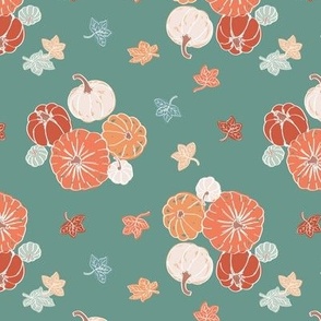 Pumpkins and leaves on forest green swatch
