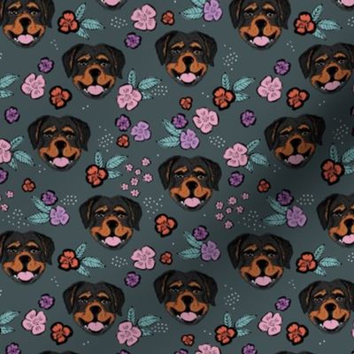 Blossom Rottweiler puppies with flowers and leaves freehand drawn dog illustration in pink blue on slate gray charcoal 
