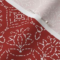 White Embroidery Look on Red
