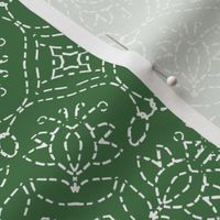 White Embroidery Look on Green