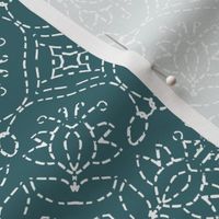 White Embroidery Look on Teal Blue