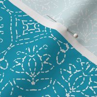 White Embroidery Look on Turquoise Blue