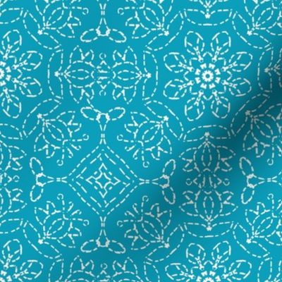 White Embroidery Look on Turquoise Blue