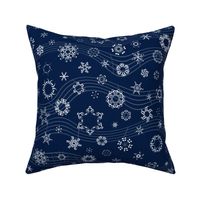 wind-blown musical snowflakes on navy