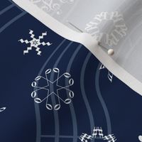 wind-blown musical snowflakes on navy