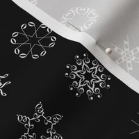 musical snowflakes on black