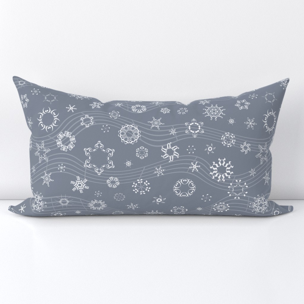 wind-blown musical snowflakes on grey
