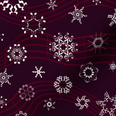 wind-blown musical snowflakes on burgundy
