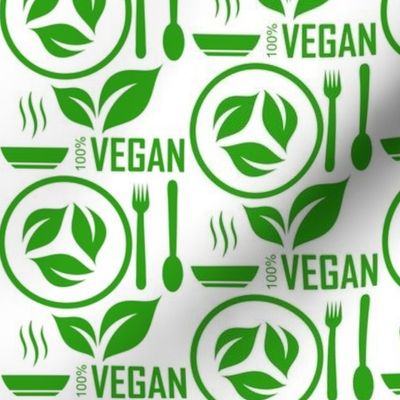 go vegan vegetarian fresh plant based diet with spoon, fork and green leaves