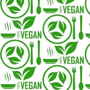 go vegan vegetarian fresh plant based diet with spoon, fork and green leaves