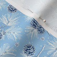 Christmas cones on a light blue background