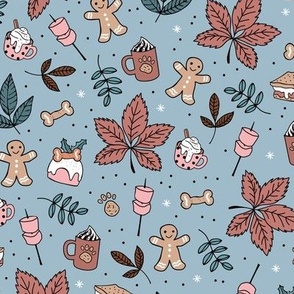 Winter picnic camping with smores coffee and hot chocolate dog cookies and marshmallow  christmas day in the park moody blue pink beige on blue