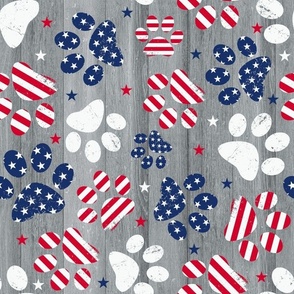 Large Scale Patriotic Dog Paw Prints Red White and Blue Stars and Stripes on Grey Barn Wood