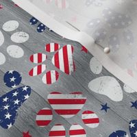 Medium Scale Patriotic Dog Paw Prints Red White and Blue Stars and Stripes on Grey Barn Wood