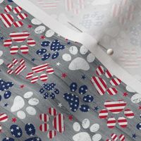 Small Scale Patriotic Dog Paw Prints Red White and Blue Stars and Stripes on Grey Barn Wood