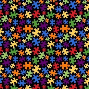 Small Scale Puzzle Pieces Bright Rainbow Colors on Black
